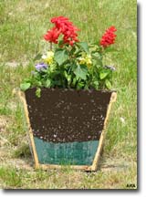 cut-away picture of a pot using better than rocks.